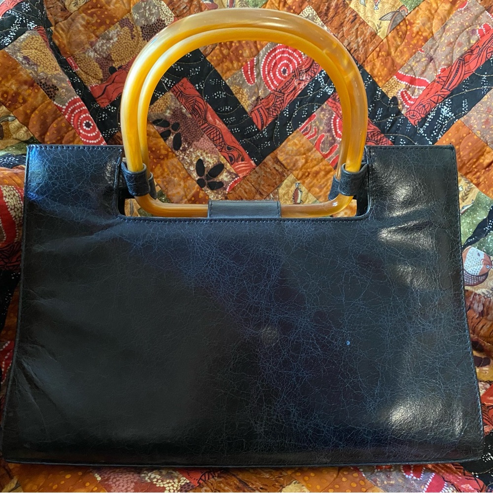 Gorgeous lacquered purse, Bakelite handle and shoulder strap.